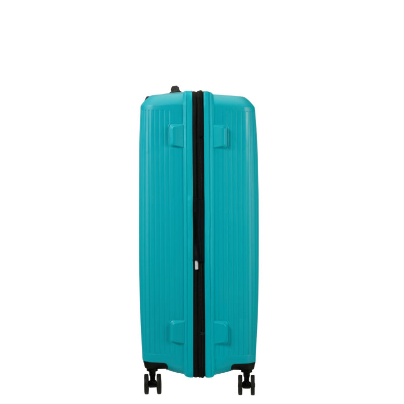 American Tourister AeroStep Spinner 4-kerekes keményfedeles bővíthető bőrönd 77 x 50 x 29/32 cm, türkiz