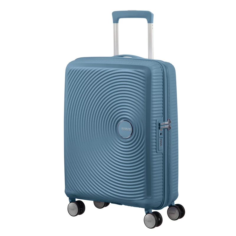 American Tourister Soundbox 4-kerekes keményfedeles bővíthető kabin bőrönd 55x40x20/23 cm, szürkés kék