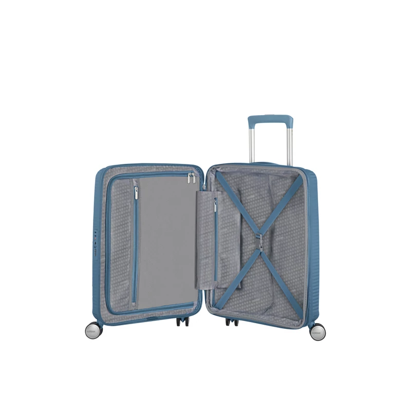 American Tourister Soundbox 4-kerekes keményfedeles bővíthető kabin bőrönd 55x40x20/23 cm, szürkés kék