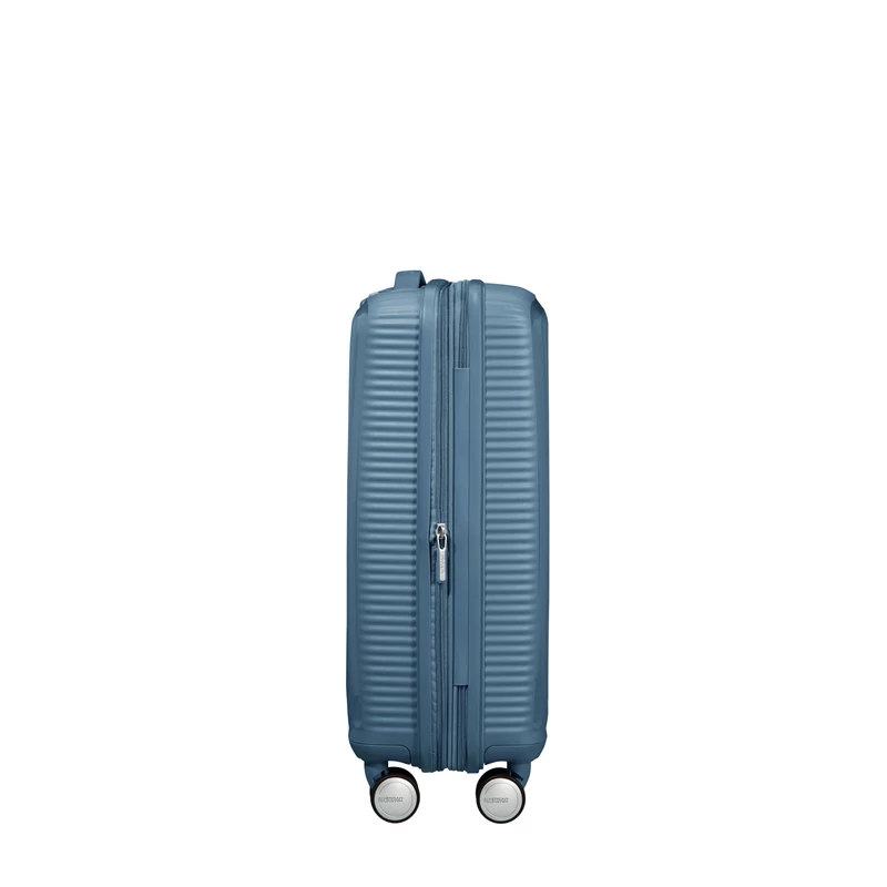 American Tourister Soundbox 4-kerekes keményfedeles bővíthető kabin bőrönd 55x40x20/23 cm, szürkés kék