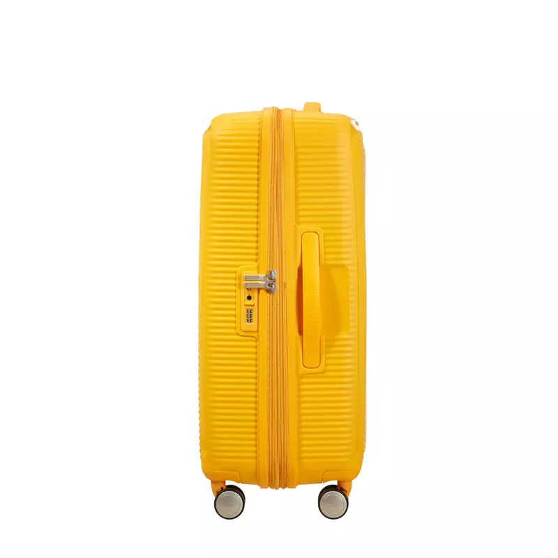 American Tourister Soundbox 4-kerekes keményfedeles bővíthető bőrönd 67 x 46.5 x 29/32 cm, sárga