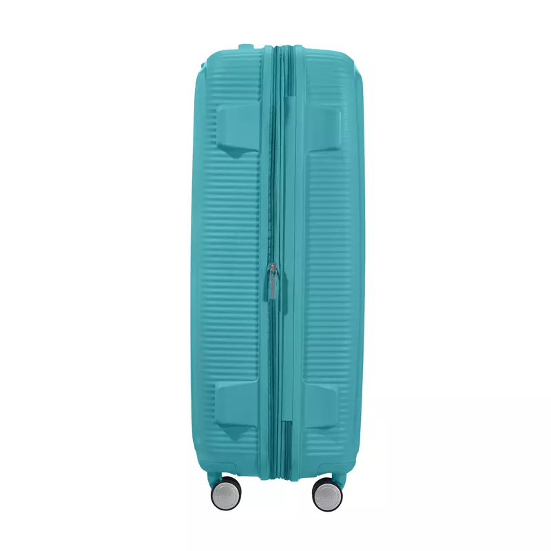 American Tourister Soundbox 4-kerekes keményfedeles bővíthető bőrönd 77 x 51.5 x 29.5/32.5 cm, türkiz