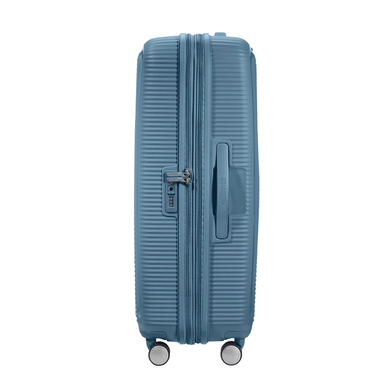 American Tourister Soundbox 4-kerekes keményfedeles bővíthető bőrönd 77 x 51.5 x 29.5/32.5 cm, szürkés kék