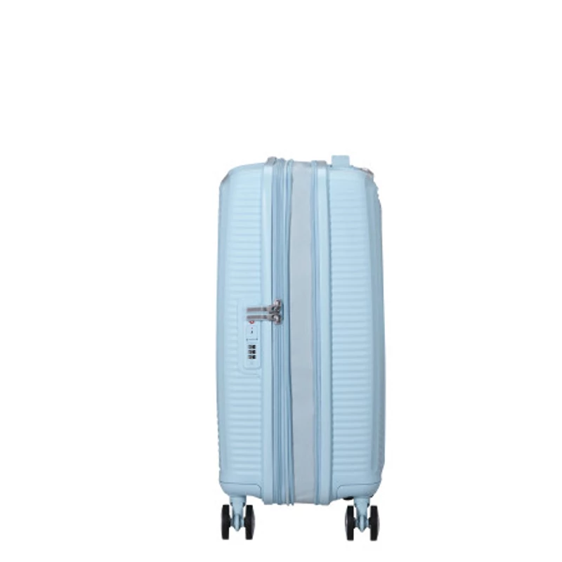American Tourister Soundbox 4-kerekes keményfedeles bővíthető kabin bőrönd 55x40x20/23 cm, pasztell kék