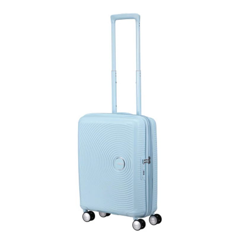 American Tourister Soundbox 4-kerekes keményfedeles bővíthető kabin bőrönd 55x40x20/23 cm, pasztell kék