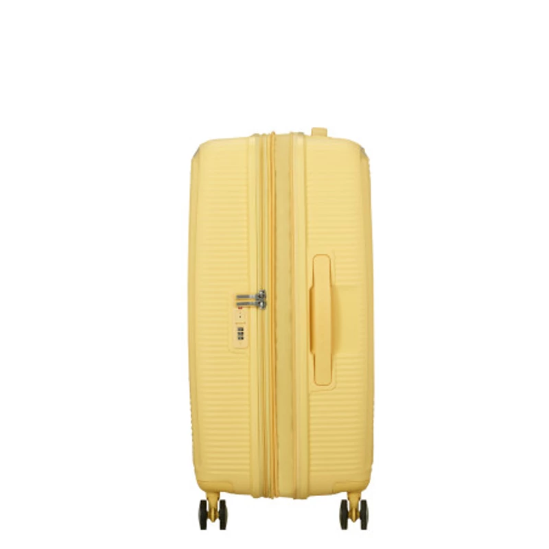 American Tourister Soundbox 4-kerekes keményfedeles bővíthető bőrönd 67 x 46.5 x 29/32 cm, pasztell sárga