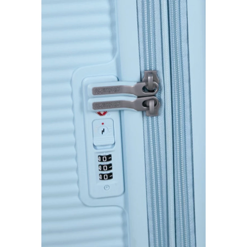 American Tourister Soundbox 4-kerekes keményfedeles bővíthető bőrönd 67 x 46.5 x 29/32 cm, pasztell kék