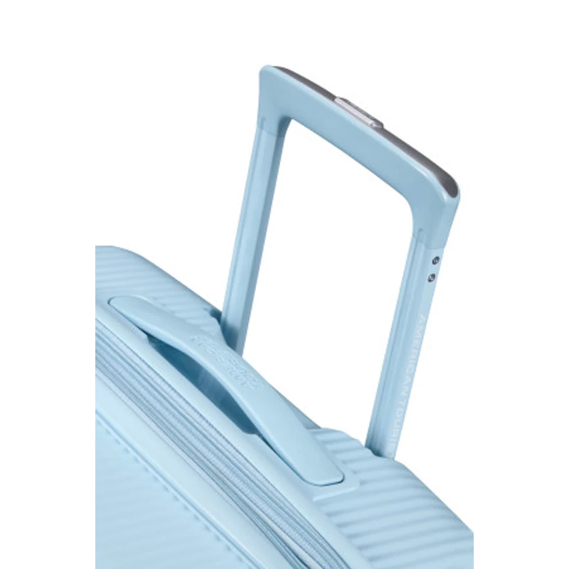 American Tourister Soundbox 4-kerekes keményfedeles bővíthető bőrönd 67 x 46.5 x 29/32 cm, pasztell kék