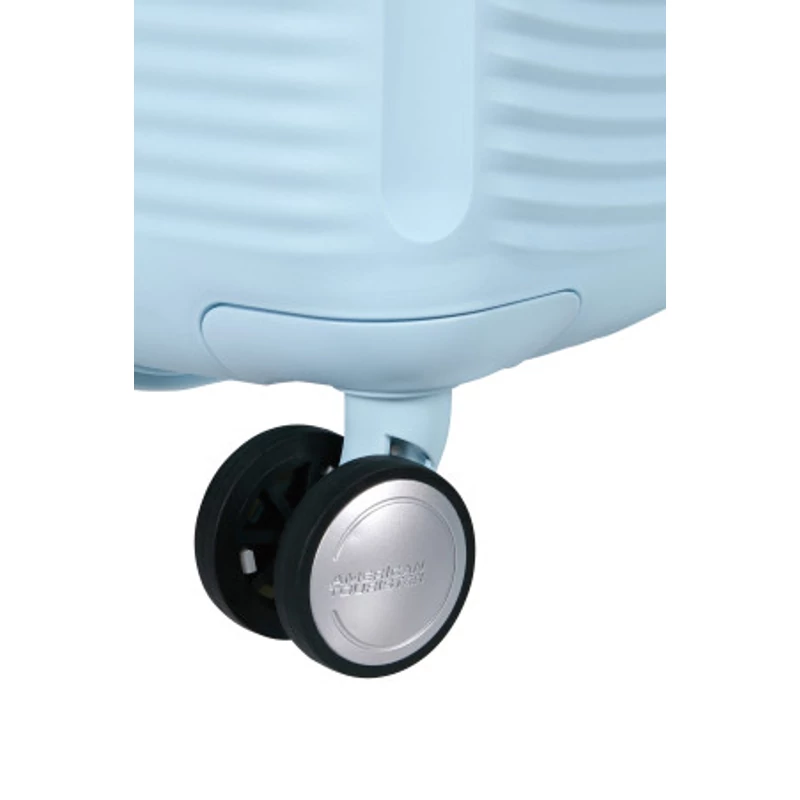 American Tourister Soundbox 4-kerekes keményfedeles bővíthető bőrönd 67 x 46.5 x 29/32 cm, pasztell kék