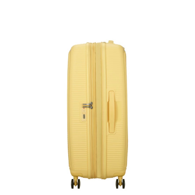 American Tourister Soundbox 4-kerekes keményfedeles bővíthető bőrönd 77 x 51.5 x 29.5/32.5 cm, pasztell sárga