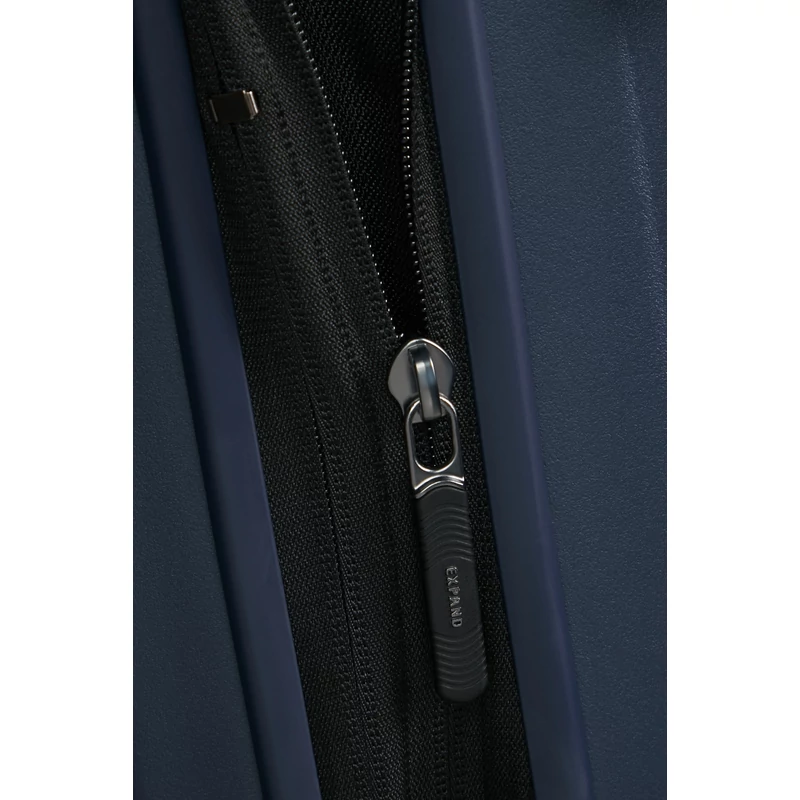 Samsonite Restackd spinner 4-kerekes keményfedeles bővíthető bőrönd 68 x 46 x 26/29cm, sötétkék