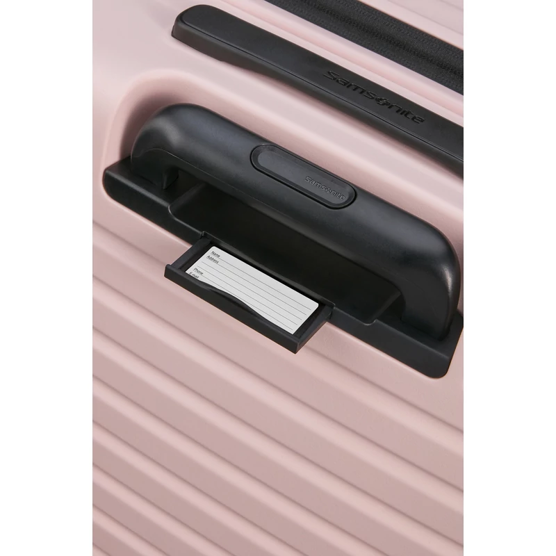Samsonite Restackd spinner 4-kerekes keményfedeles bővíthető kabin bőrönd 55 x 40 x 20/23 cm, halvány rózsaszín