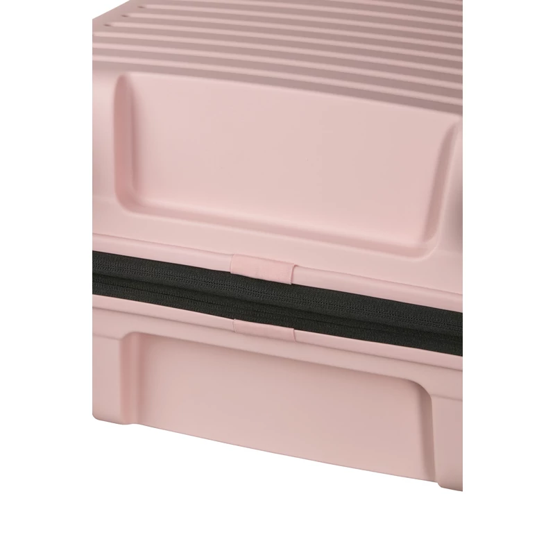 Samsonite Restackd spinner 4-kerekes keményfedeles bővíthető kabin bőrönd 55 x 40 x 20/23 cm, halvány rózsaszín