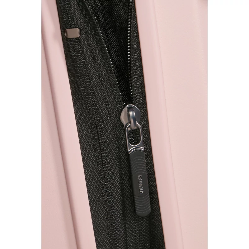 Samsonite Restackd spinner 4-kerekes keményfedeles bővíthető kabin bőrönd 55 x 40 x 20/23 cm, halvány rózsaszín