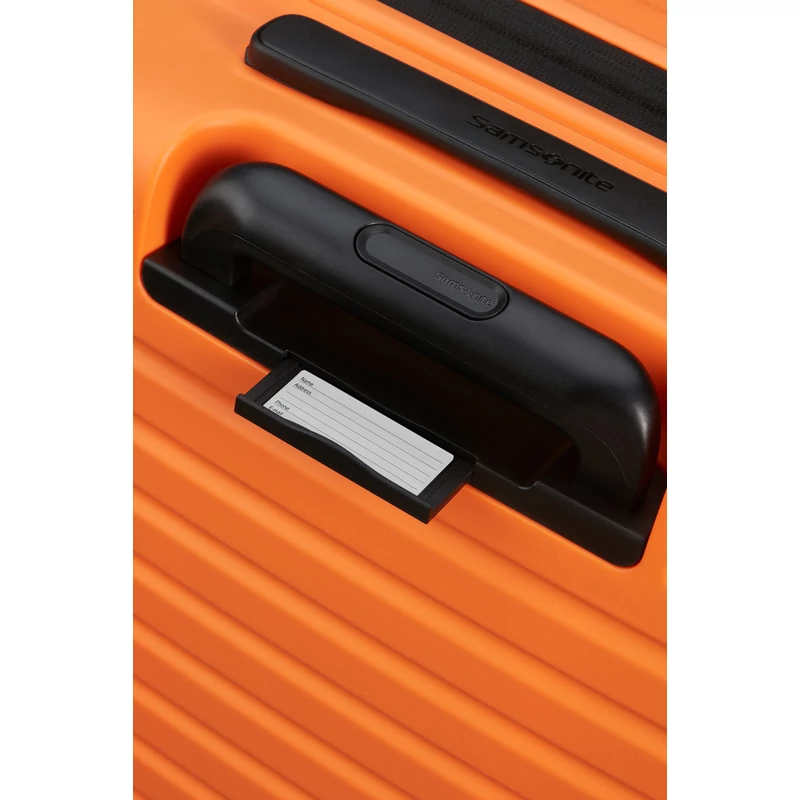 Samsonite Restackd spinner 4-kerekes keményfedeles bővíthető kabin bőrönd 55 x 40 x 20/23 cm, narancssárga