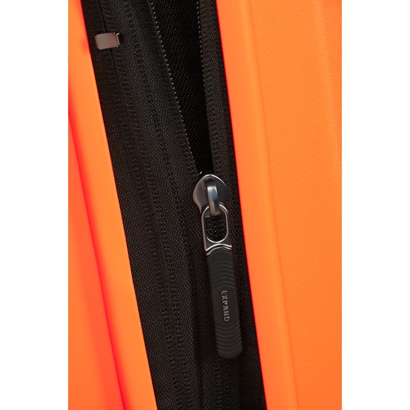 Samsonite Restackd spinner 4-kerekes keményfedeles bővíthető kabin bőrönd 55 x 40 x 20/23 cm, narancssárga