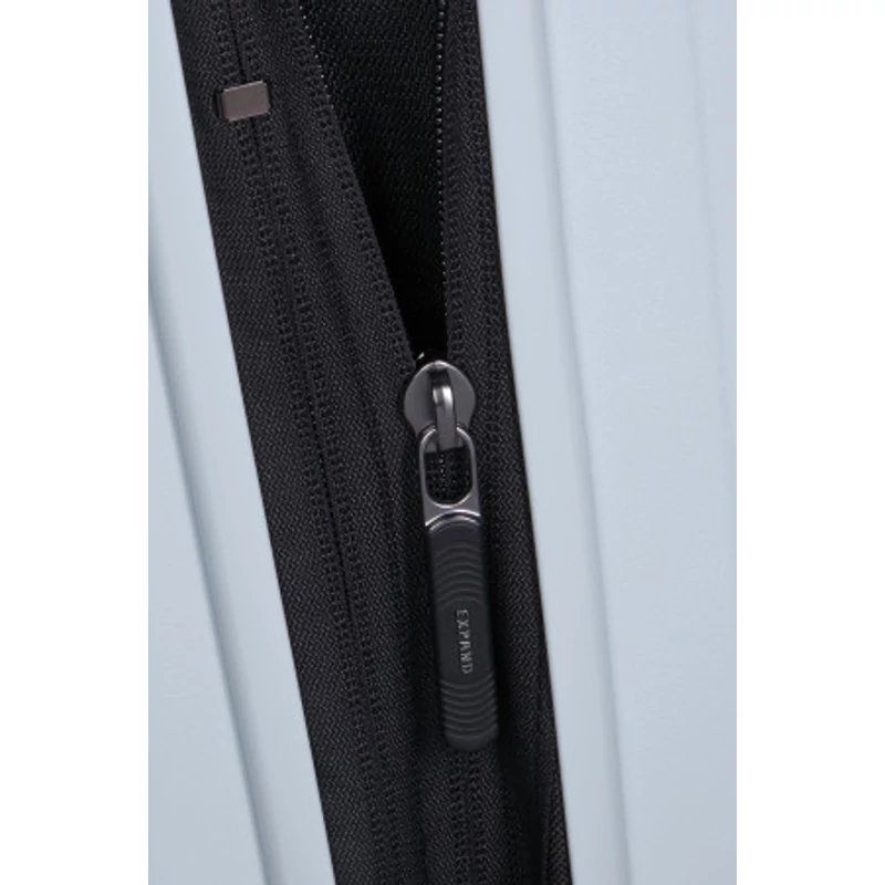 Samsonite Restackd spinner 4-kerekes keményfedeles bővíthető extra nagy bőrönd 81 x 54 x 31/34 cm, halvány kék