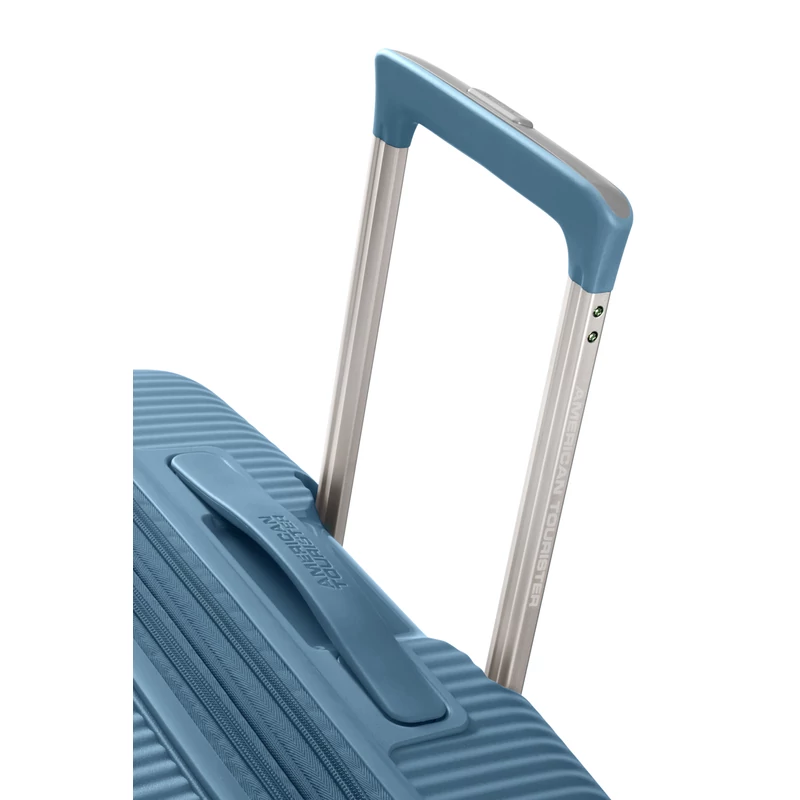 American Tourister Soundbox 4-kerekes keményfedeles bővíthető bőrönd 77 x 51.5 x 29.5/32.5 cm, szürkés kék