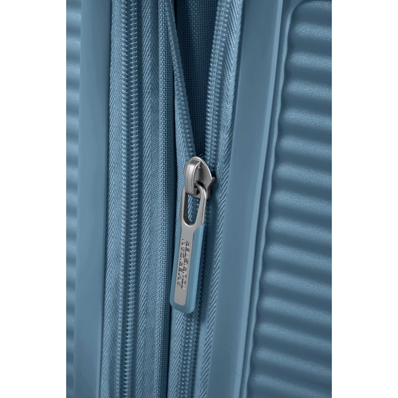 American Tourister Soundbox 4-kerekes keményfedeles bővíthető kabin bőrönd 55x40x20/23 cm, szürkés kék