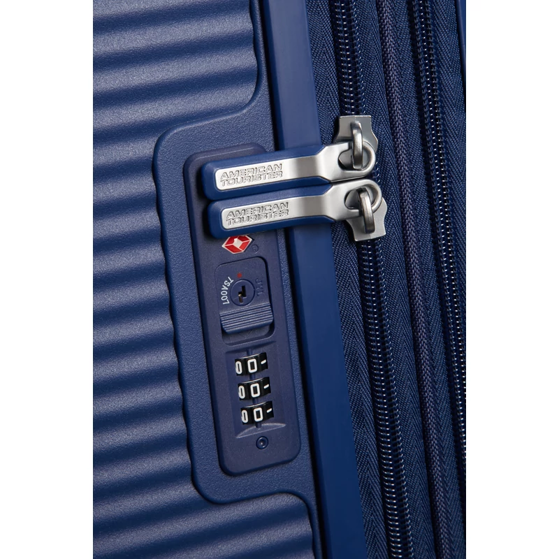 American Tourister Soundbox 4-kerekes keményfedeles bővíthető kabin bőrönd 55x40x20/23 cm, sötétkék