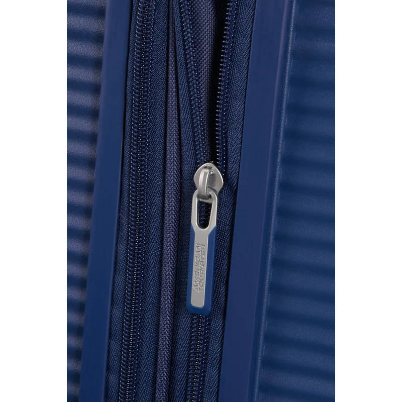 American Tourister Soundbox 4-kerekes keményfedeles bővíthető kabin bőrönd 55x40x20/23 cm, sötétkék